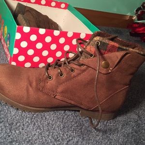 Brown boots with red flannel lining